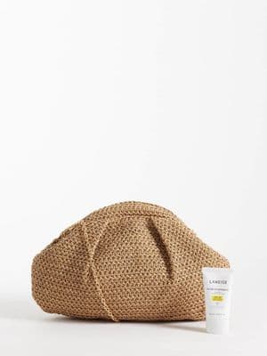 Glamorous straw pillow clutch bag