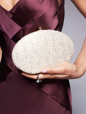 True Decadence round structured woven clutch bag